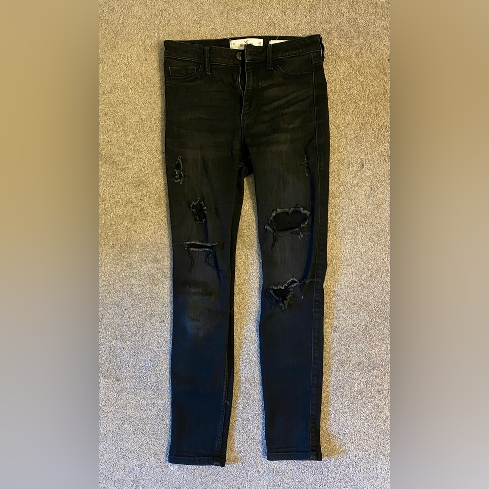 Black, skinny jeans, have rips